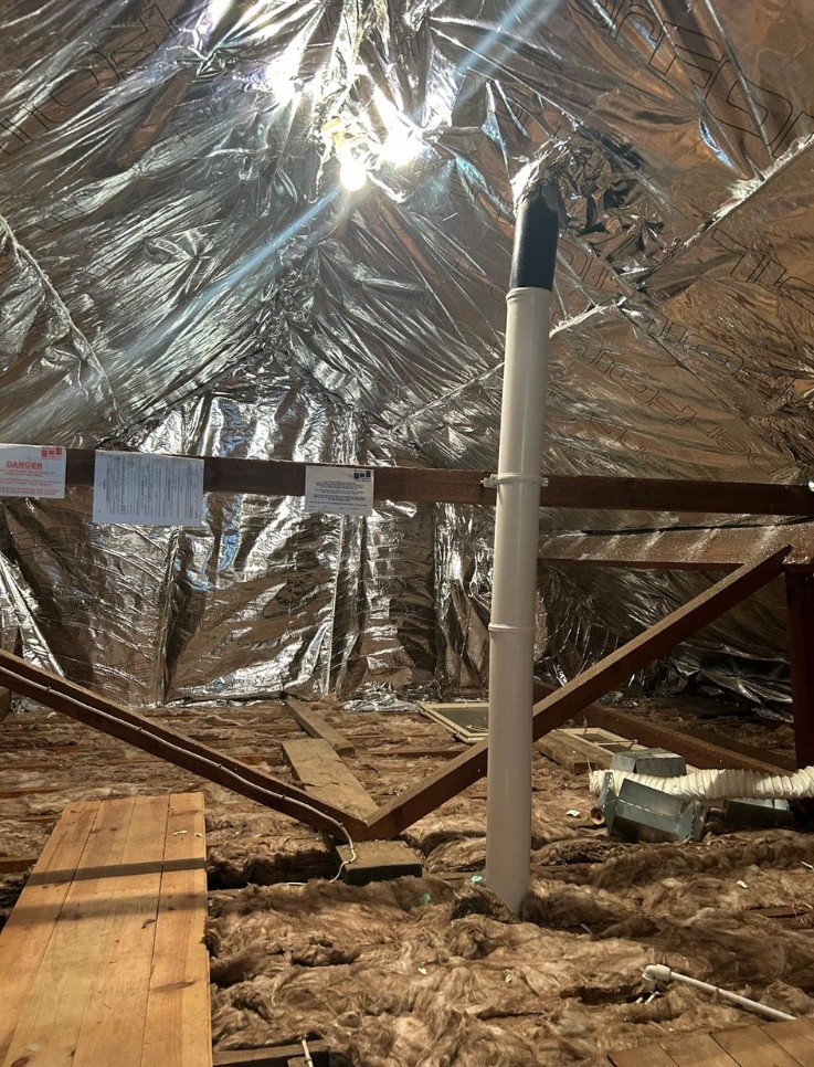 Full SuperFoil rafter wrap with soil vent pipe penetration sealed