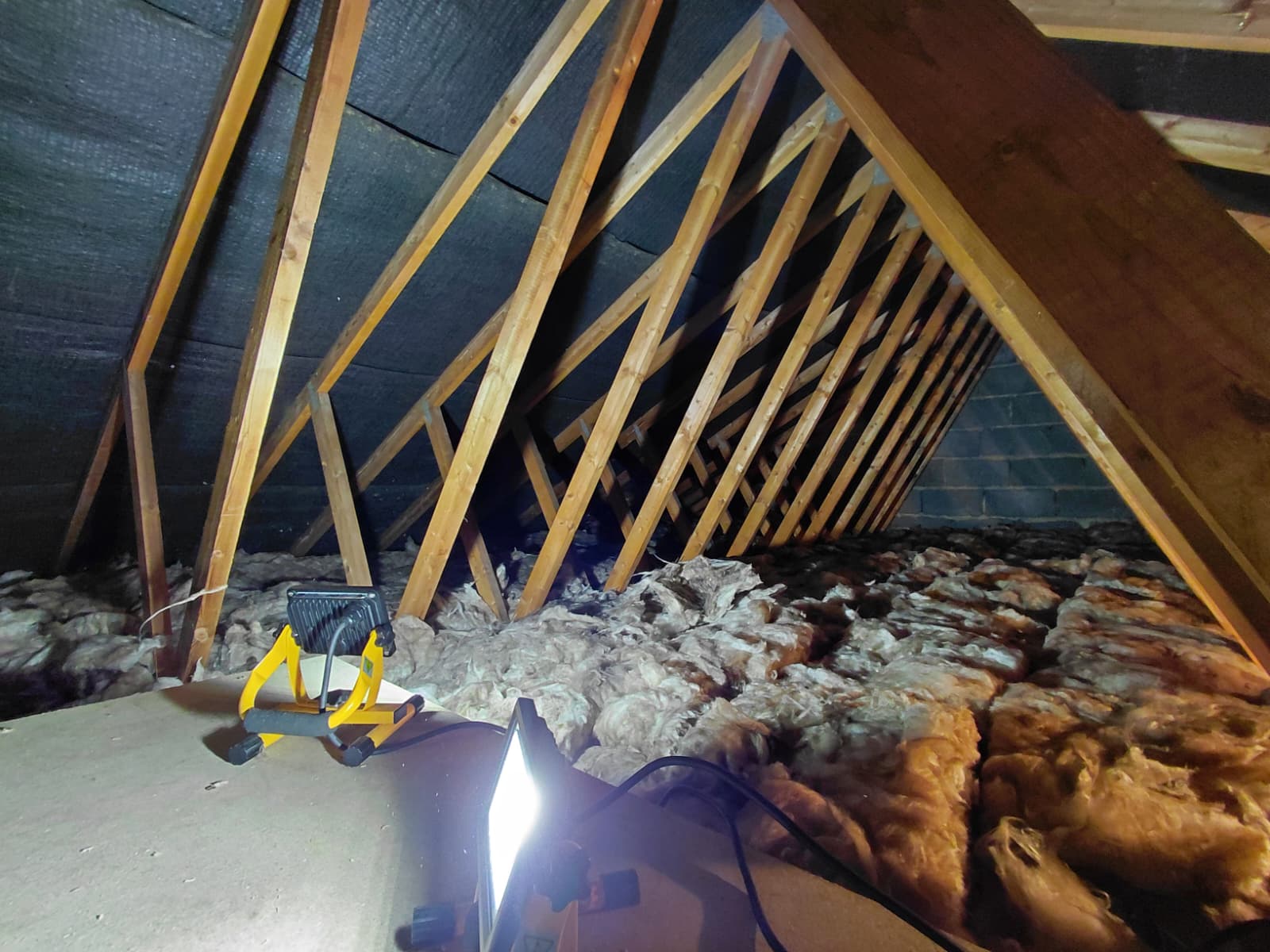 Mineral wool laid between joists with light kit set up