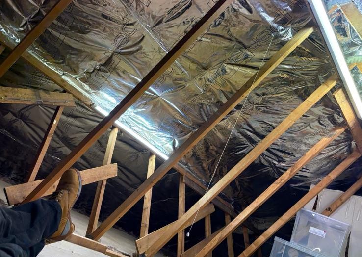 SuperFoil multifoil installed over mineral wool between joists